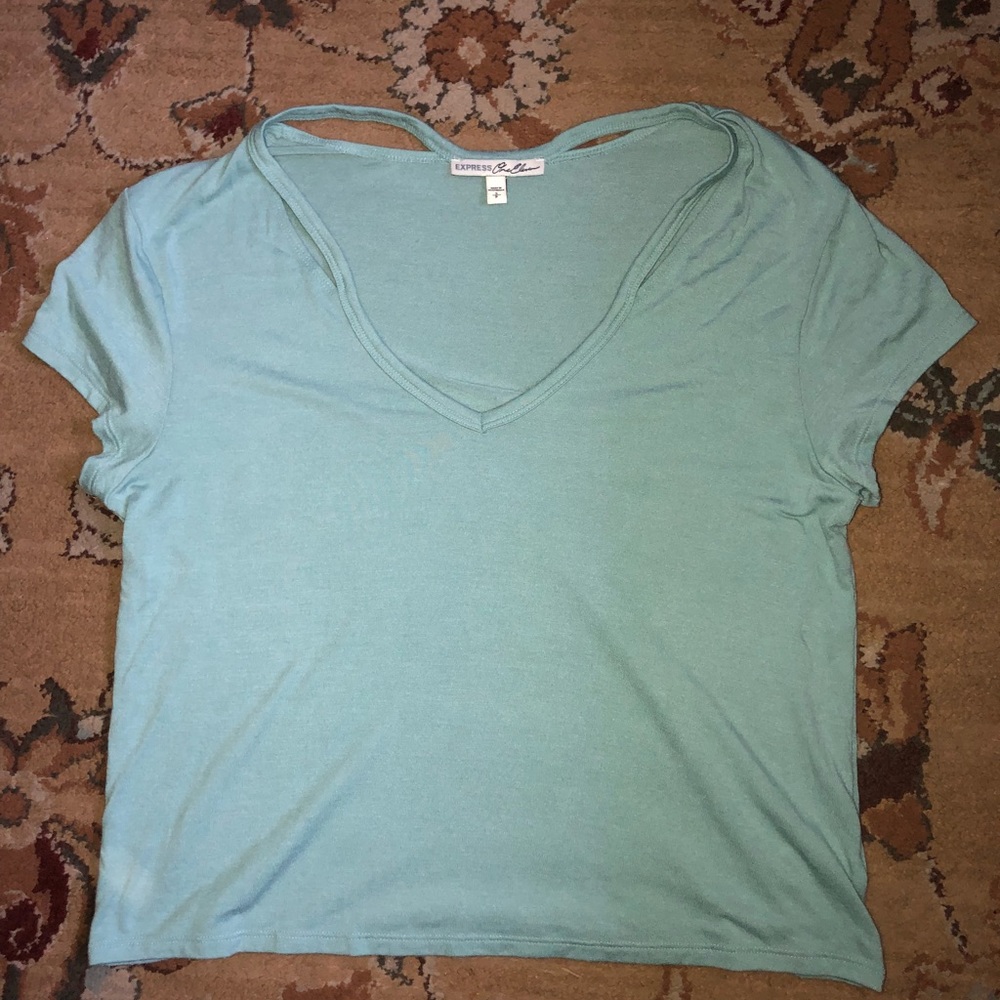 Light blue cropped top. Only worn a couple times.